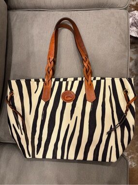 Dooney & Bourke Black and Cream Zebra Canvas Tote with Brown Leather Handles